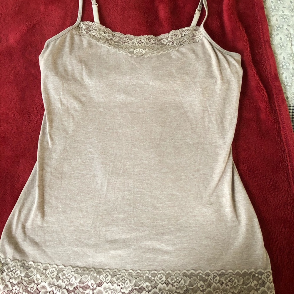 Express cami with lace detail at hem.